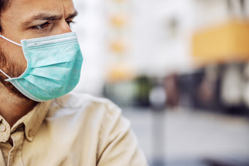 Portrait of man with mask, prevent infection of Covid-19 virus coronavirus,contamination of germs or bacteria. Infection prevention and control of epidemic. Protective suit and mask.