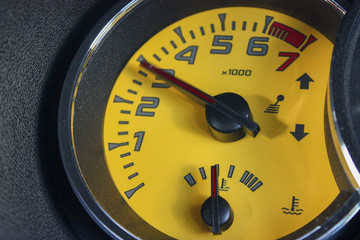 Yellow tachometer at 3000 rpm