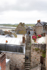 Mont Saint-Michel in the Britanny redion of France overcast sky