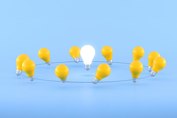 Minimal conceptual idea of light bulb surround with yellow bulbs on blue background. 3D rendering.
