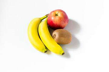 Composition with fruits: banana, apple and kiwi isolated on white background