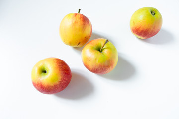 Composition with fruits: apples isolated on white background