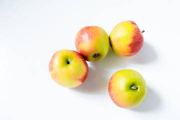 Composition with fruits: apples isolated on white background
