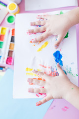 Painted girls fingers. Drawing at home. Children games and leisure during vacation