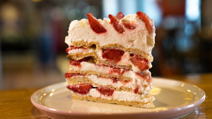 strawberry cake on a platter close