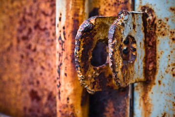 old rusty lug on a rusty metal door
