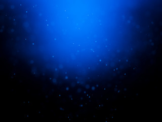 Blue bokeh on a dark background. Blur the background and wallpaper