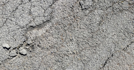 texture of old cracked asphalt surface background
