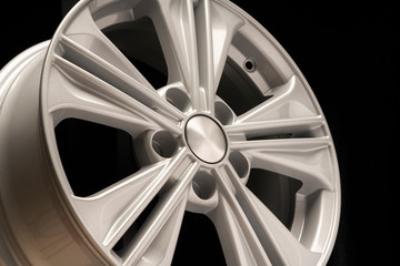 new aluminum alloy wheel, silver color on a black background