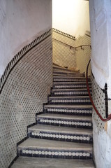 Beautiful staircase with mosaic tiles at Fes old town.