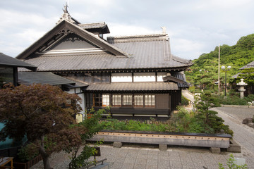  a traditional style japanese house in a garden