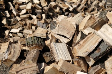 Pile of wood, close-up on cut pieces of wood