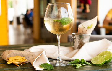 a glass of Lemoncello on the black table