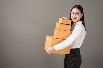 Beautiful happiness  woman with box portrait  in studio