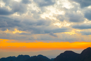 Fototapeta premium Mountain sunset colorful twilight sky with cloud