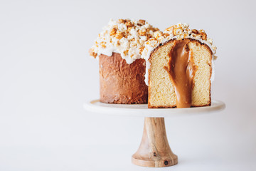 Delicious and appetizing Easter cake on a white background. Happy Easter card. Copy space