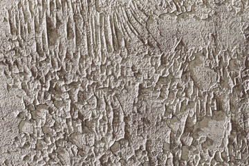 Abstract grey textured background Wallpaper. Old peeling paint on a rough, cracked wall