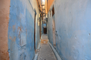 An aisle with blue colour brick wall at Fes.