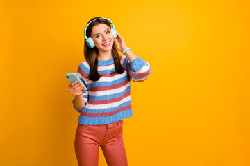 Portrait of her she nice attractive lovely cheerful cheery brown-haired girl listening hard rock...