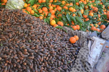 Dates and tangerine that selling at the fez market.