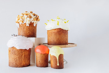 Modern stylish easter pies with toppings, festive composition in rustic style, russian orthodox tradition, vintage wooden background,