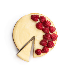 Homemade cheesecake with raspberry isolated on white. Top view
