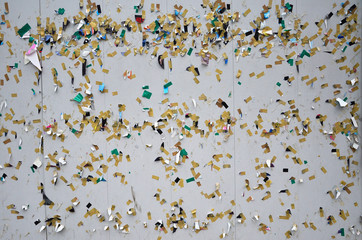 Wall with torn label sticker.