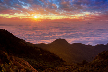 Fototapeta na wymiar Sunrise at Phu chee dao peak of mountain in Chiang rai,Thailand