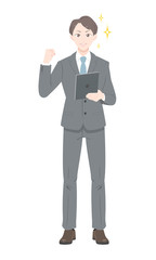 ガッツ　ポーズ　ビジネス　スーツ　タブレット　足開く　男性　全身