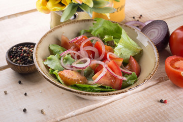Salad with greens, meat, eggs and tomatoes