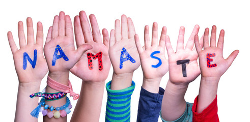Children Hands Building Colorful Indian Word Namaste Means Hello. White Isolated Background