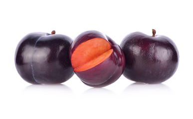 Prunes fruit on white background.