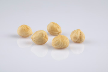 Peeled roasted hazelnuts in perspective angle