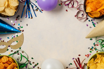 Background with snacks, balloons, party hat, confetti. Perfect for a party. Top view.