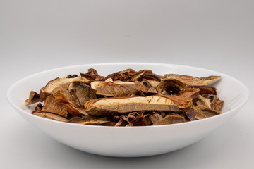 Dried porcini mushrooms. Traditional ingredient for cooking healthy food.