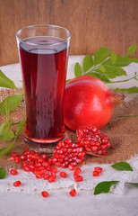 Pomegranate juice isolate on background.