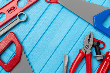 kids, children colorful toys, tools, wrenches, instrument background with copy space