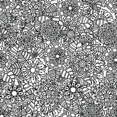 Doodle black and white floral hand drawn background. Flowers and leaves zentangle style seamless pattern