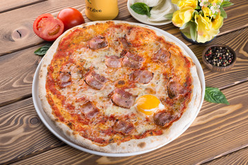 Delicious pizza with cheese, tomatoes and olives