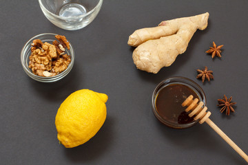 Health remedy relief foods for cold and flu on a black background.