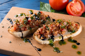 Sandwich with tomatoes, vegetables and greens