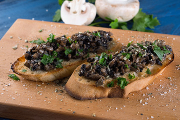 Sandwich with mushrooms and greens