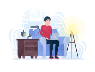 Man works at home office on a laptop, sitting in a armchair. Freelance or distance studying