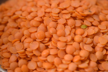 Dry Split Red Lentils as an abstract background texture