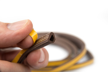 Selfadhesive seal on the door on a white background