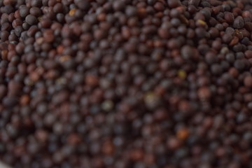 Mustard seeds as an abstract background texture
