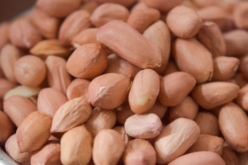Dry peanut texture. Many peanut grains on the pile  Whole background