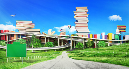 Education concept. Stacks of books as city on a nature background.