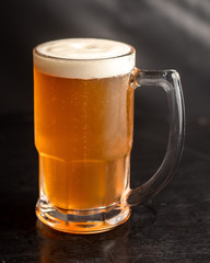 mug with beer chopp on bar