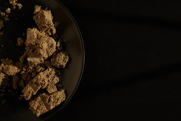 Halva on a black plate